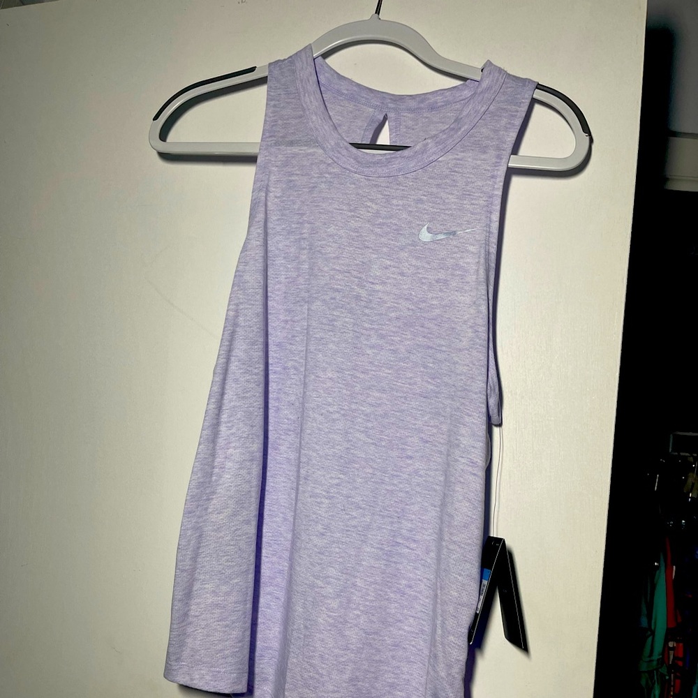 Nike Dry Material I’m light purple. Matching cropped leggings on my page.